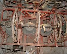 DSC00352 Bell chamber from above. No. 1 on right is rung up. No2. appears to have a broken stay! Note the unusual headstock of No.4 on left.